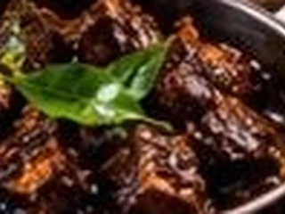 Black Pork Curry with Coconut Roti and Lunu Miris